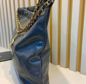 BOLSA CC 22 SHINY CALFSKIN MEDIA CINZA